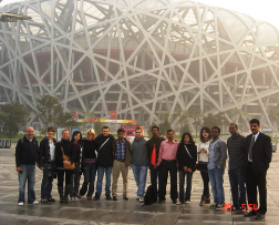 Young Earth scientists - and Executive Secretary Edmund Nickless (left) - gather in Beijing